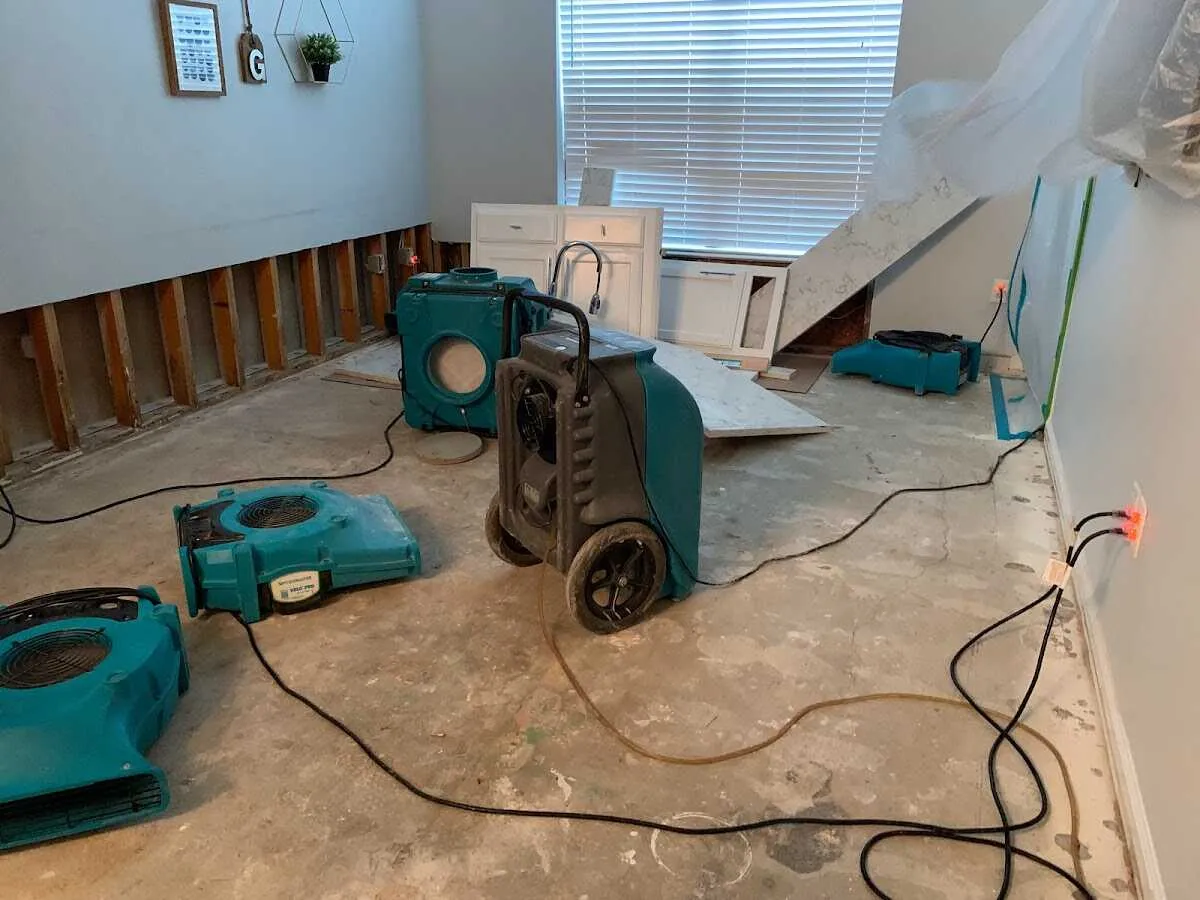 Dehumidifier in flood-cut room for Water Damage Restoration in Bridge City